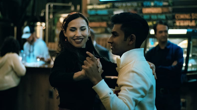 A couple enjoys Kizomba dance at Neighbor's Pub in Virginia Highland. At least 30 couples have met at Reframed dance classes. Courtesy of Wilder Smith