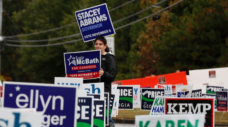 Posting unauthorized signs along state highways is illegal. The Georgia Department of Transportation removes thousands of signs like these in an election year. BOB ANDRES / BANDRES@AJC.COM