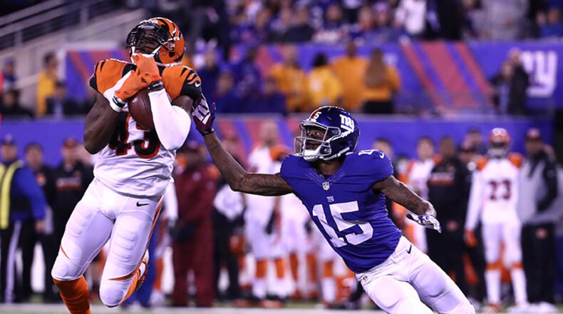 EAST RUTHERFORD, NJ - NOVEMBER 14: George Iloka #43 of the Cincinnati Bengals intercepts a ball intended for Tavarres King #15 of the New York Giants during the fourth quarter of the game at MetLife Stadium on November 14, 2016 in East Rutherford, New Jersey. (Photo by Al Bello/Getty Images)