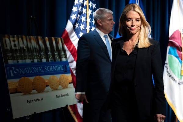 Attorney General Pam Bondi leaves following a news conference at the Drug Enforcement Administration, Tuesday, July 15, 2025, in Arlington, Va. (AP Photo/Julia Demaree Nikhinson)