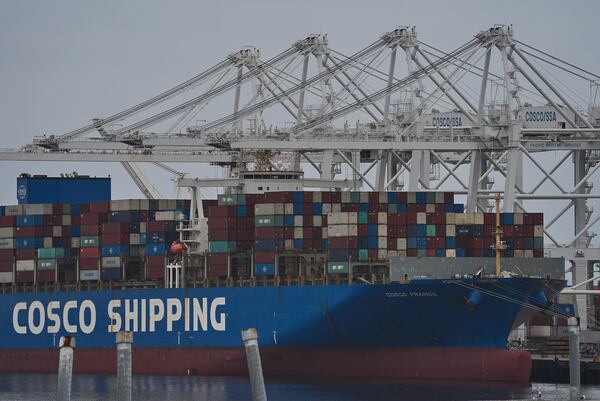 FILE -The "Cosco Shipping France" container ship is moored at the Long Beach Container Terminal, LBCT, at Middle Harbor in the Port of Long Beach, Calif., , April 15, 2025. (AP Photo/Damian Dovarganes, File)