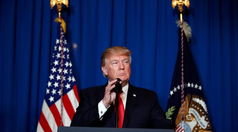 President Donald Trump speaks at Mar-a-Lago in Palm Beach, Fla., Thursday, April 6, 2017, after the U.S. fired a barrage of cruise missiles into Syria Thursday night in retaliation for this week's gruesome chemical weapons attack against civilians. (AP Photo/Alex Brandon)