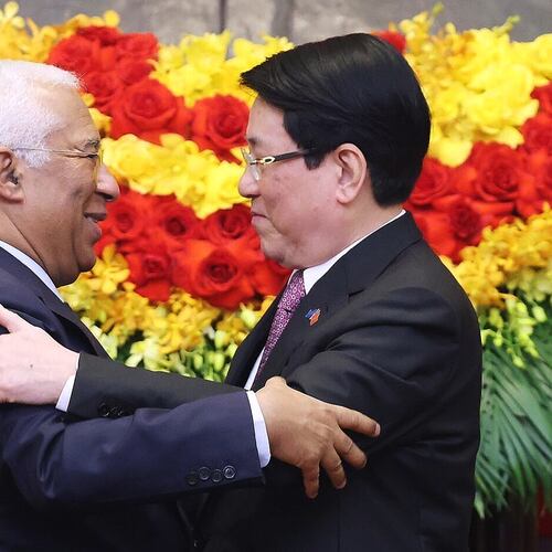European Council President Antonio Costa, left, and Vietnamese President Luong Cuong hug after a press conference in Hanoi, Vietnam, Thursday, Jan. 29, 2026. (Bui Lam Khanh/VNA via AP)