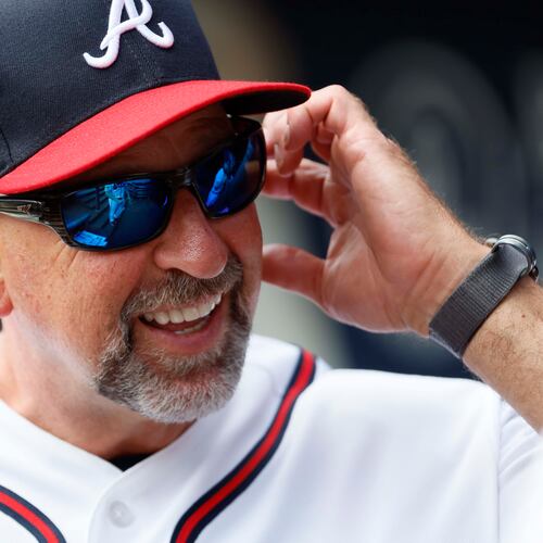 Atlanta Braves manager Walt Weiss smiles while talking with a team member prior to the game against the Oakland Athletics at Truist Park on Wednesday, April 1, 2026, in Atlanta. (Miguel Martinez/AJC)