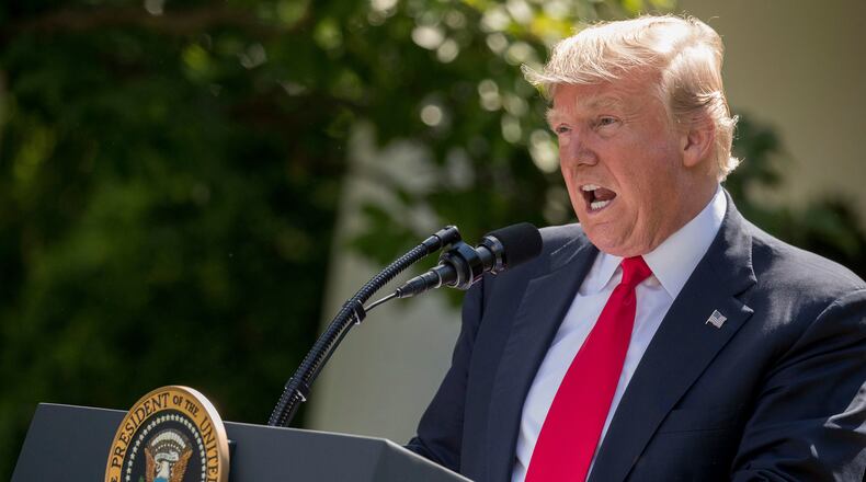 President Donald Trump speaks about the U.S. role in the Paris climate change accord, Thursday, June 1, 2017, in the Rose Garden of the White House in Washington. (AP Photo/Andrew Harnik)