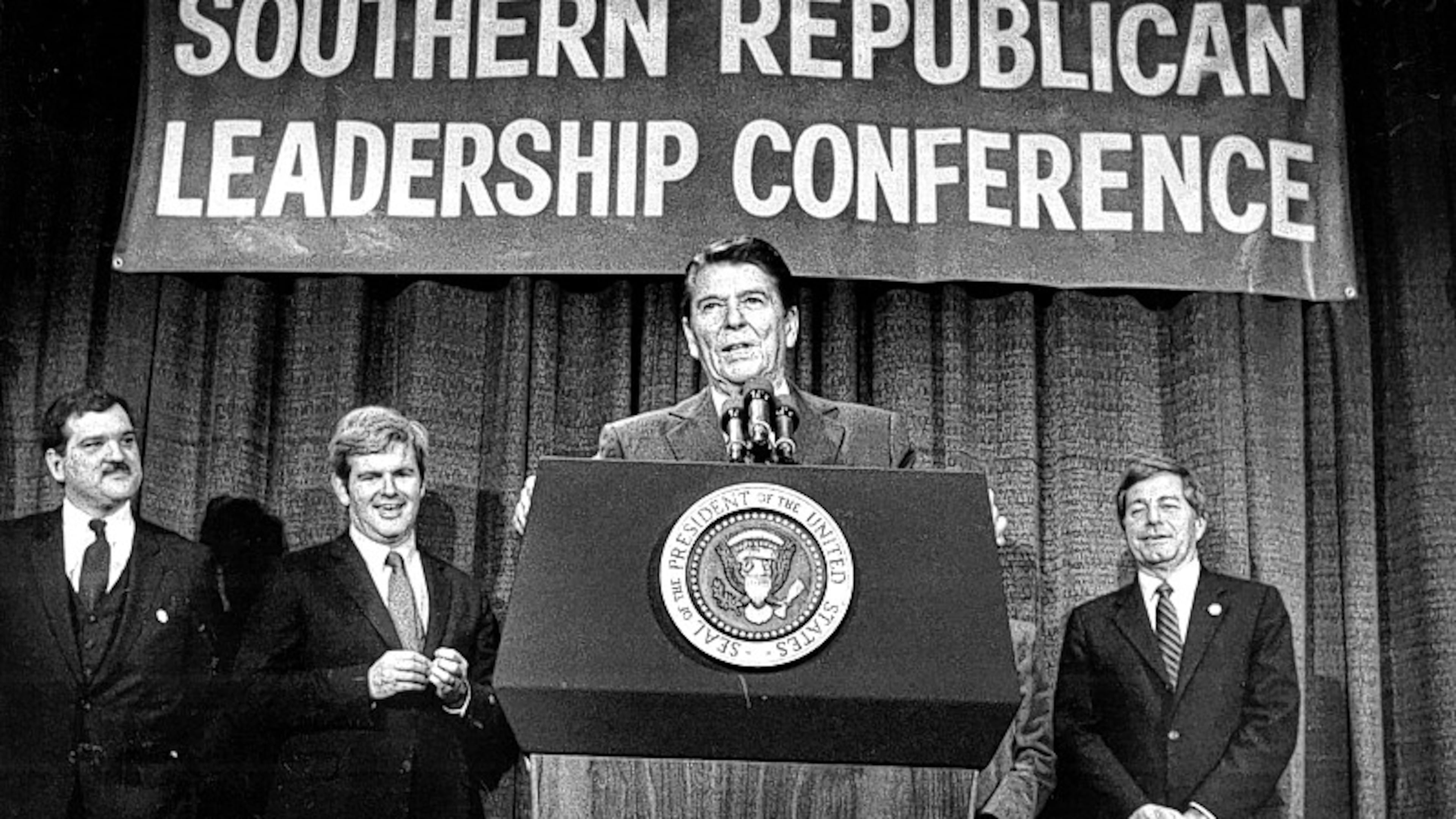 President Ronald Reagan, in 1984 in Atlanta, stood with Southern GOP Chairman Bill Harris (left), Newt Gingrich and Mack Mattingly as he promised a new "Solid South" for Republicans. (File)