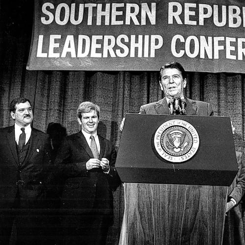 President Ronald Reagan, in 1984 in Atlanta, stood with Southern GOP Chairman Bill Harris (left), Newt Gingrich and Mack Mattingly as he promised a new "Solid South" for Republicans. (File)