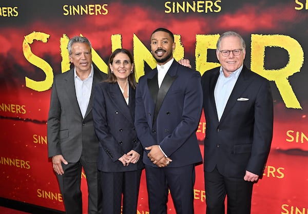 Warner Bros. Motion Picture Group CEO Mike De Luca, Warner Bros. Motion Picture Group CEO Pam Abdy, actor Michael B. Jordan and Warner Bros. Discovery CEO David Zaslav pose together at the premiere of "Sinners" at AMC Lincoln Square on Thursday, April 3, 2025, in New York. (Photo by Evan Agostini/Invision/AP)