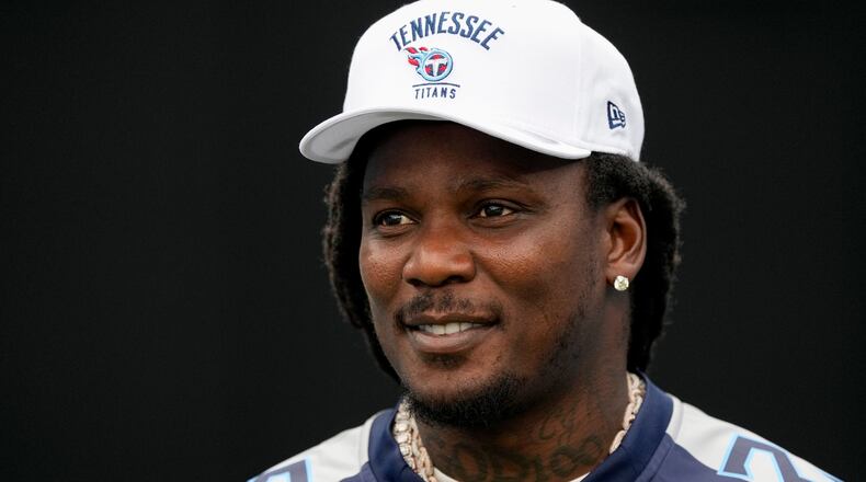 FILE - Former Tennessee Titans running back Chris Johnson visits the field during the second half of an NFL football game against the New York Jets, Sept. 15, 2024, in Nashville, Tenn. (AP Photo/George Walker IV, file)
