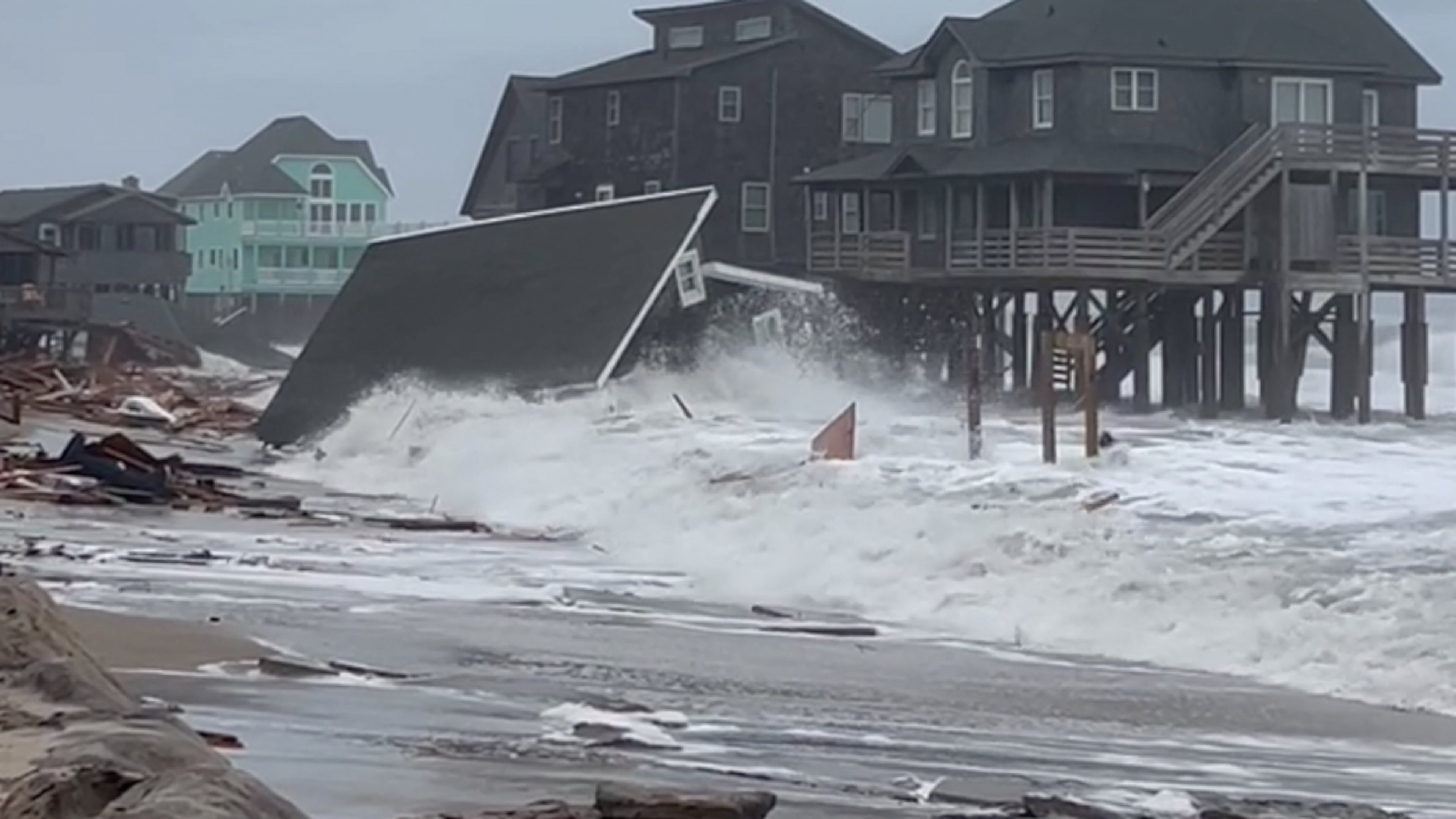 Waves from Hurricanes Humberto and Imelda destroy a home in Buxton, N.C., Tuesday, Sept. 30, 2025. (Heather Jennette via AP)