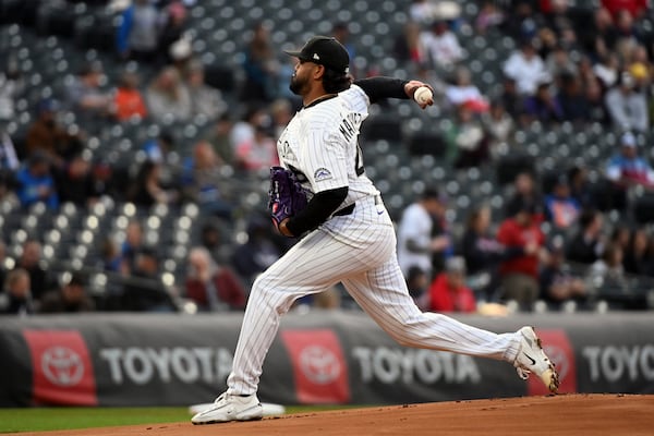 Colorado Rockies starting pitcher Germán Márquez (48) delivers a pitch in the first inning of a baseball game against the Atlanta Braves, Tuesday, April 29, 2025, in Denver. (AP Photo/Geneva Heffernan)