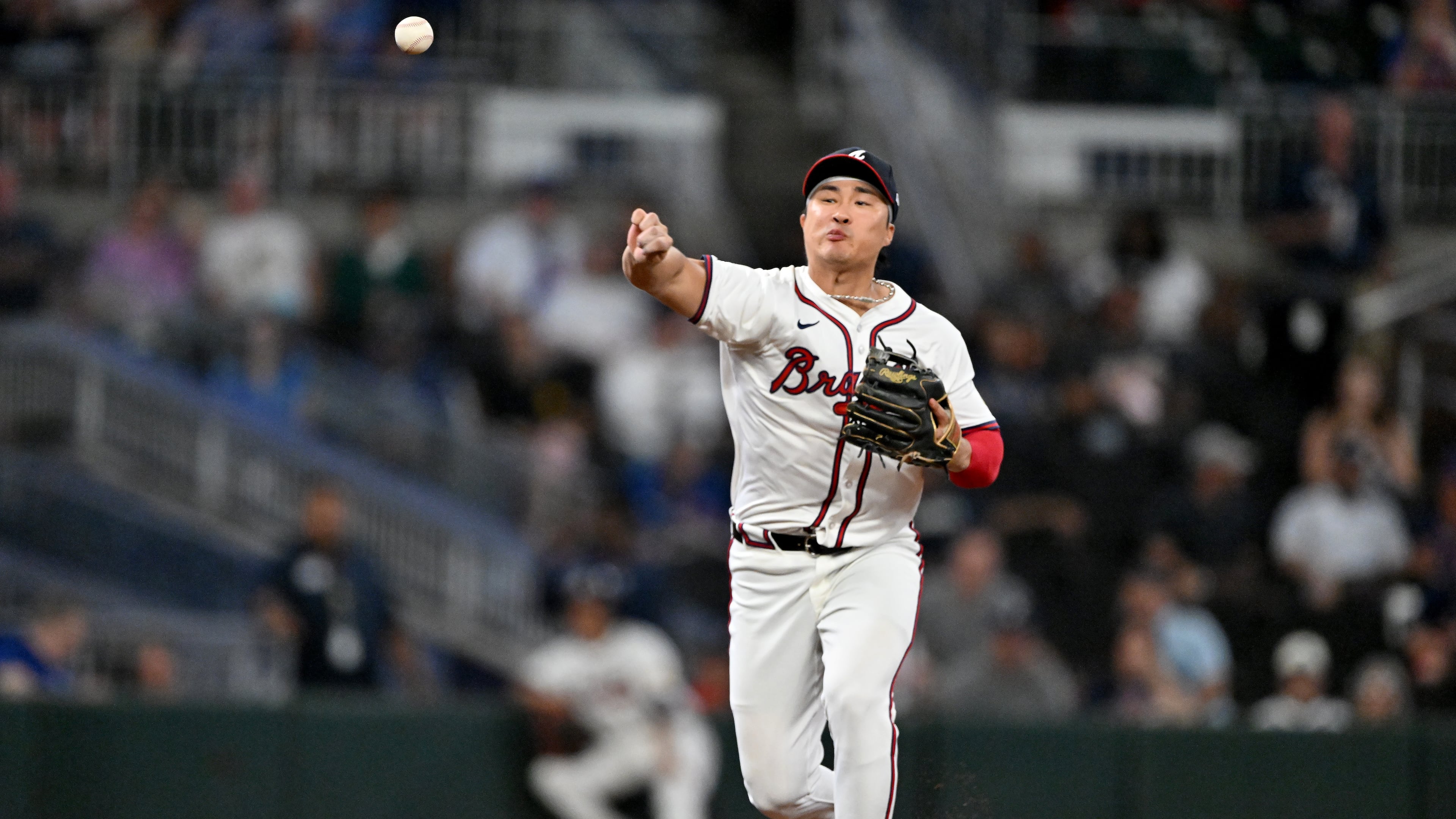 Atlanta Braves shortstop Ha-Seong Kim throws to first for the groundout hit by Chicago Cubs third base Matt Shaw during the seventh inning of a baseball game at Truist Park, Tuesday, Sept. 9, 2025, in Atlanta. (Hyosub Shin / AJC)