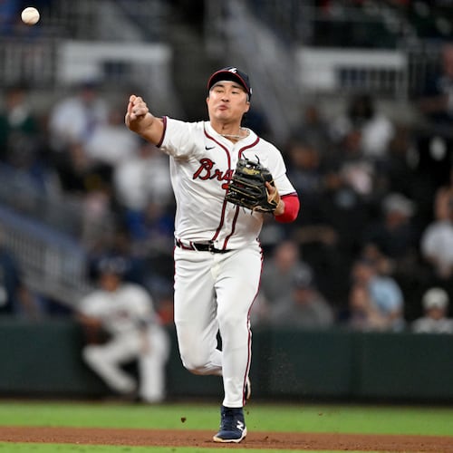 Atlanta Braves shortstop Ha-Seong Kim throws to first for the groundout hit by Chicago Cubs third base Matt Shaw during the seventh inning of a baseball game at Truist Park, Tuesday, Sept. 9, 2025, in Atlanta. (Hyosub Shin / AJC)