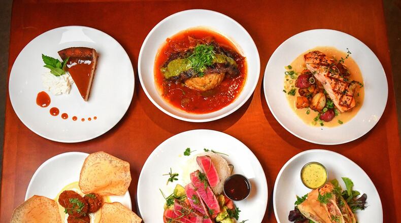 Top row from left: Guava Cheesecake, Churrasco Steak Mofongo, Bay of Fundy Grilled Salmon, (bottom row from left) Crab Beignets, Ahi Tuna Special, Cuban Spring Rolls, (bottom) Pimento Cheese Fritters.  (Contributed by Chris Hunt Photography)