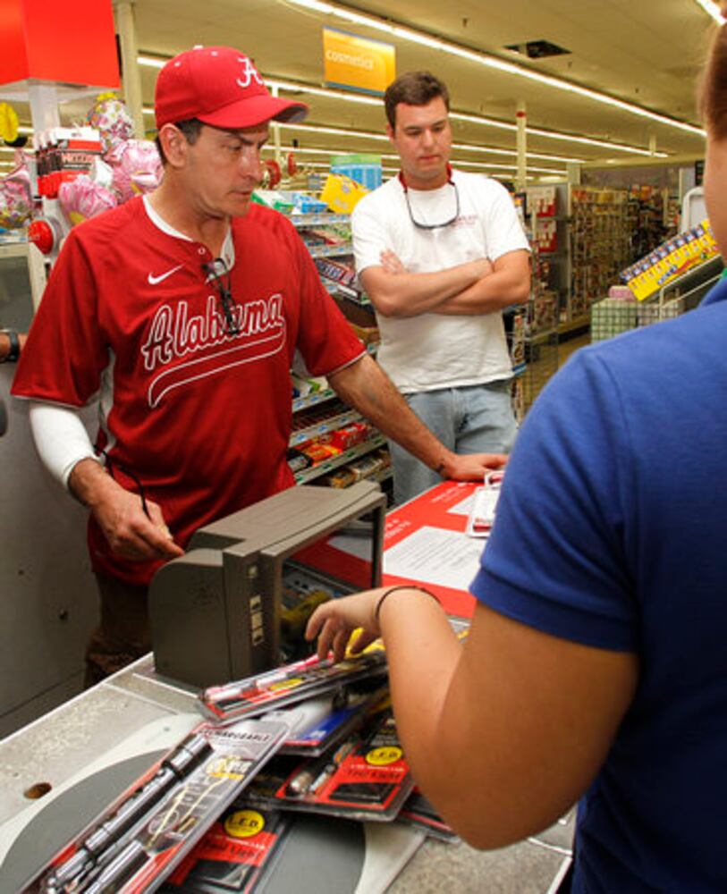 Charlie Sheen tours tornado damage in Alabama