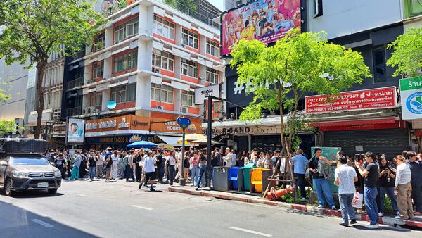 People who evacuated from buildings following earthquake in Bangkok, Thailand, Friday, March 28, 2025. (AP Photo/Chutima Lalit)