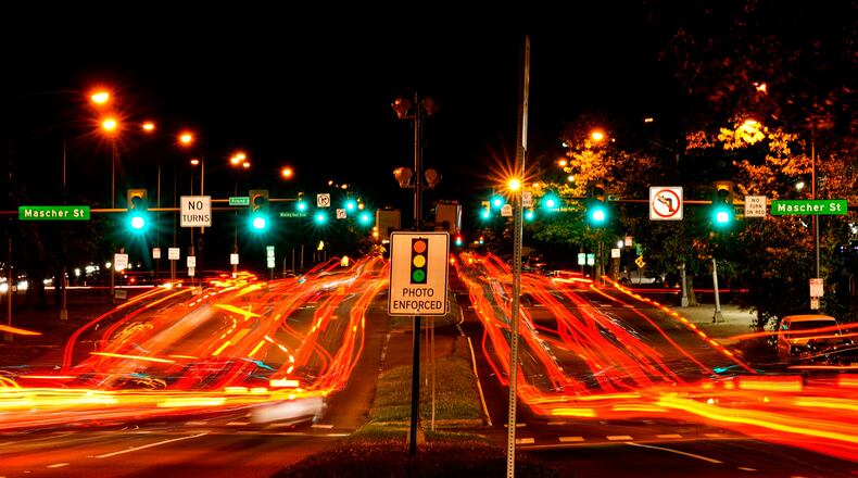 FILE - This long exposure photo shows traffic driving on Roosevelt Boulevard in Philadelphia, May 25, 2022. (AP Photo/Matt Rourke, File)