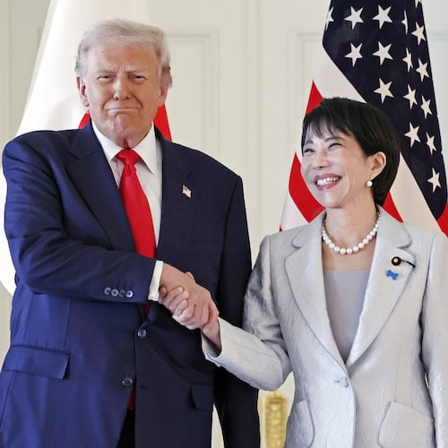 President Donald Trump, left, and Japanese Prime Minister Sanae Takaichi shake hands before their summit talk at Akasaka Palace in Tokyo, Tuesday, Oct. 28, 2025. (Kyodo News via AP)