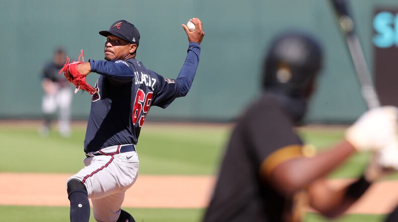 030421 Bradenton: Atlanta Braves pitcher Jasseel De La Cruz delivers against the Pittsburgh Pirates during the fifth inning of a MLB spring training baseball game at LECOM Park on Thursday, March 4, 2021, in Bradenton.   “Curtis Compton / Curtis.Compton@ajc.com”