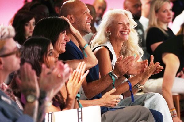 Attendees at the The Elevate Prize Foundation's Make Good Famous Summit applaud during the opening session, Tuesday, May 13, 2025, in Miami Beach, Fla. (AP Photo/Marta Lavandier)