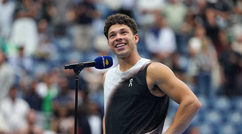 Ben Shelton, of the United States, speaks after he lost the men's singles final of the U.S. Open tennis championships against Alexander Zverev, of Germany, Sunday, Sept. 13, 2026, in New York. (AP Photo/Kirsty Wigglesworth)