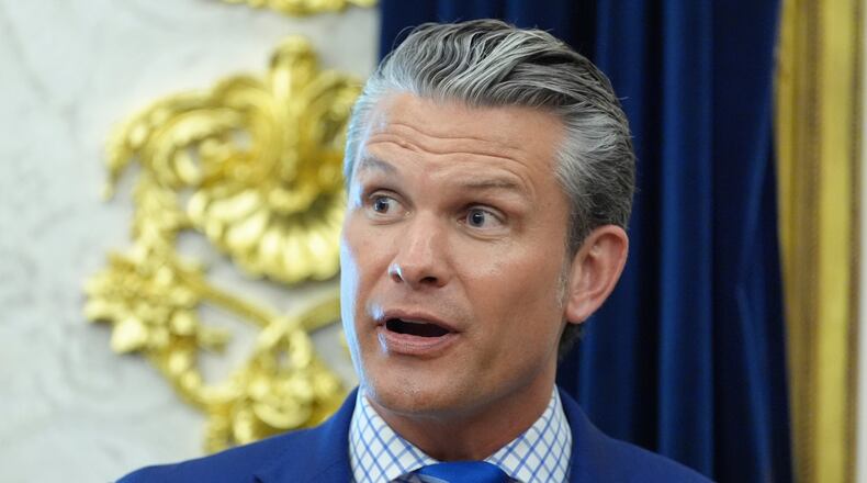 Defense Secretary Pete Hegseth speaks in the Oval Office of the White House during an executive order signing about quantum computing with President Donald Trump, Monday, June 22, 2026, in Washington. (AP Photo/Jacquelyn Martin)
