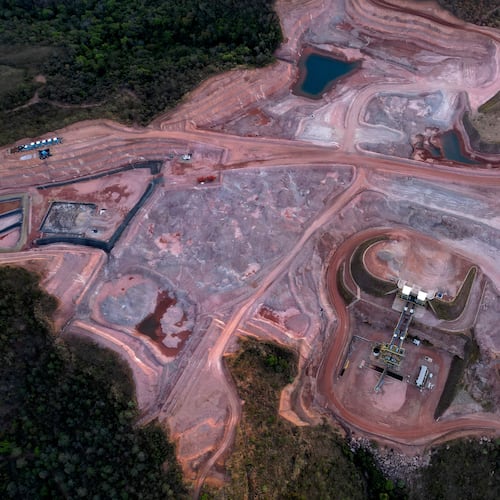 FILE - A mine operated by Serra Verde Mining digs for rare earth elements including neodymium, praseodymium, terbium and dysprosium, which are essential for the production of permanent magnets, in Minacu, Goias state, Brazil, July 28, 2025. (AP Photo/Eraldo Peres, File)