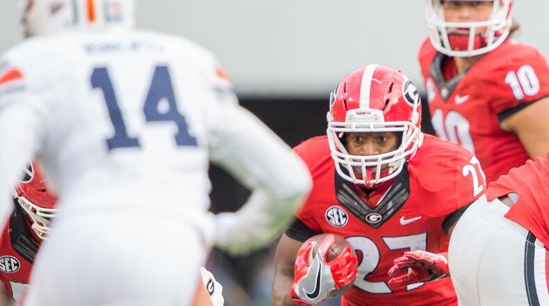 Georgia running back Nick Chubb looks to run the ball through traffic during their game against the Auburn Tigers Saturday, Nov. 12, 2016, at Sanford Stadium in Athens.