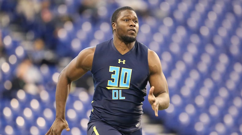 Michigan State defensive end Malik McDowell is seen before a drill at the 2017 NFL football scouting combine Sunday, March 5, 2017, in Indianapolis. (AP Photo/Gregory Payan)