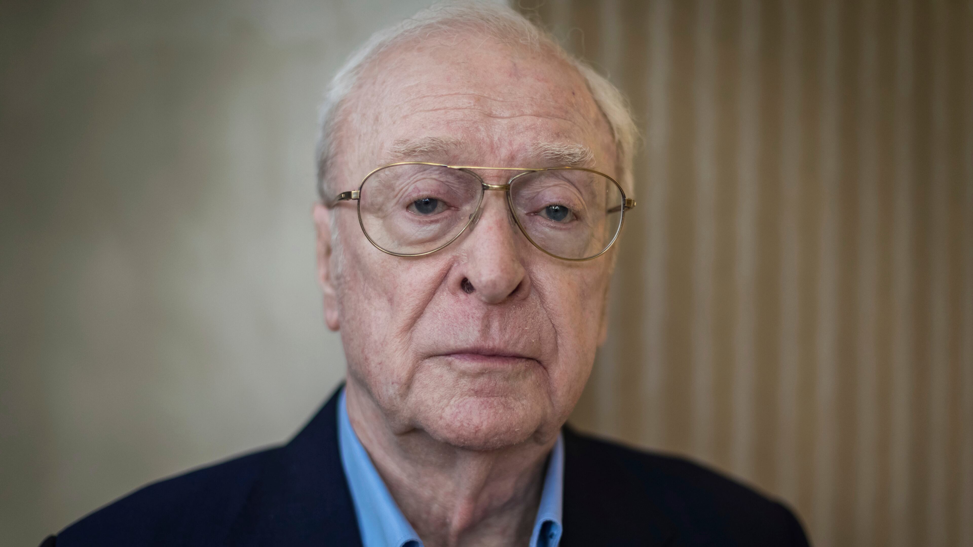 FILE - British actor Michael Caine poses for a photograph in London, Oct. 11, 2018. (Photo by Vianney Le Caer/Invision/AP, File)