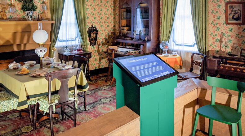 This room in the historic William Root House Museum in Marietta, Georgia, depicts life in the 1850s, including with a touchscreen tour. Cobb Landmarks