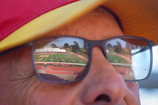 On why the baseball coach does double duty as a football coach as well, Clarke Central's David Perno said: “That whole game-day experience is what has kept me doing it. The Friday night lights, the whole community can rally around it, and I know how much it means to these kids.” (Arvin Temkar/AJC)