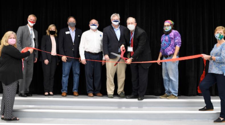 Fayette County school board officials and school staff helped celebrate the newly renovated Oak Grove Elementary School in Peachtree City. Courtesy FCBOE