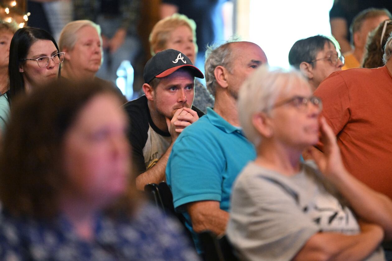 Attendees listen to presentations at the Chatsworth, Ga., town hall on Thursday, June 12, 2025. The group PFAS Georgia represents numerous residents and farmers in Dalton and Calhoun who allege their properties are contaminated with PFAS from the carpet industry. (Hyosub Shin/AJC)