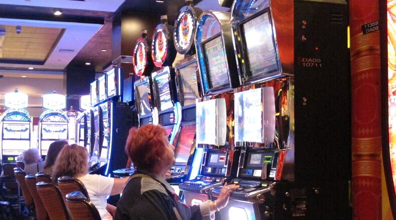 A gambler plays a slot machine at the Golden Nugget casino in Atlantic City, N.J. Pro-casino forces have launched a campaign in Atlanta to pitch Las Vegas-style gambling as a potential new revenue stream to aid the HOPE Scholarship program. (AP 2016 photo/Wayne Parry)