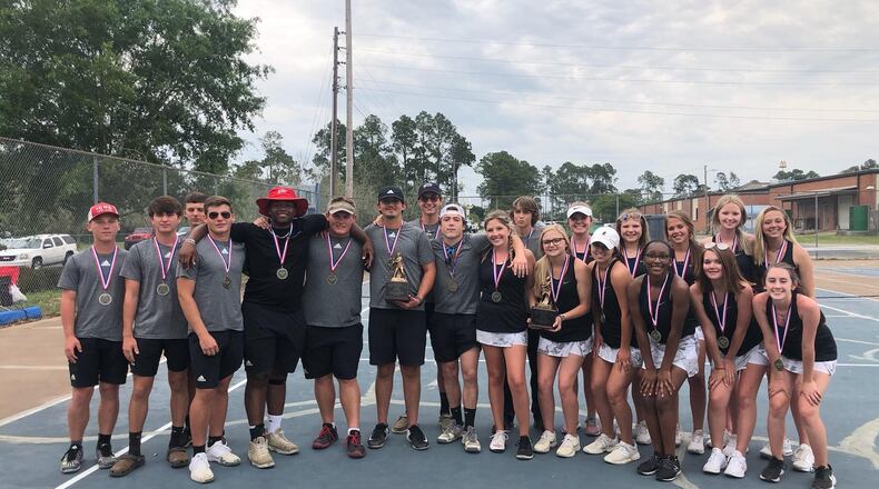 The Irwin County boys and girls tennis teams won the Region 2-A Public championships in 2021.