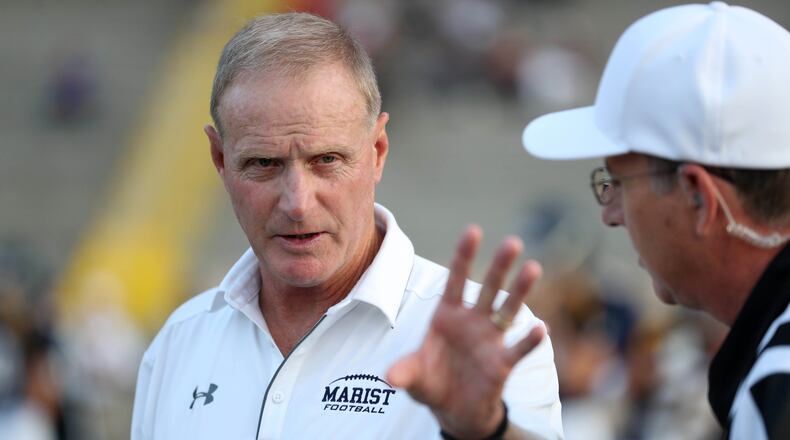 Marist head coach Alan Chadwick talks with officials before a game against in Atlanta. PHOTO / JASON GETZ