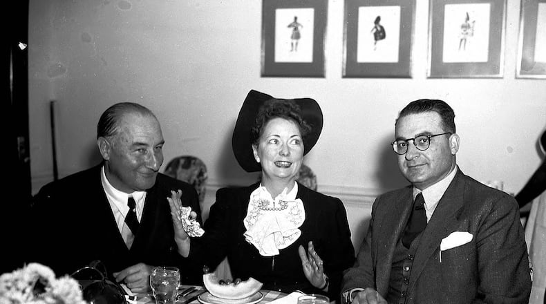 Dining with Margaret Mitchell in 1942. LBP28-192a, Lane Brothers Commercial Photographers Photographic Collection, 1920-1976. Photographic Collection, Special Collections and Archives, Georgia State University Library.