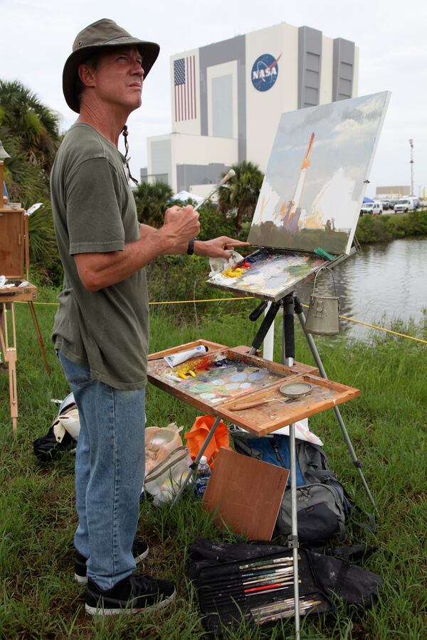 Artist Larry Moore painted the scene at the Kennedy Space Center in Cape Canaveral, Florida, during the launch of the Atlantis, the 135th and final space shuttle mission for U.S. 