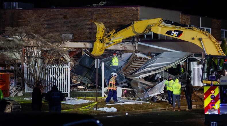 First responders work at the scene of an explosion and fire at Bristol Health & Rehab Center, Tuesday, Dec. 23, 2025, in Bristol, Pa. (Monica Herndon/The Philadelphia Inquirer via AP)