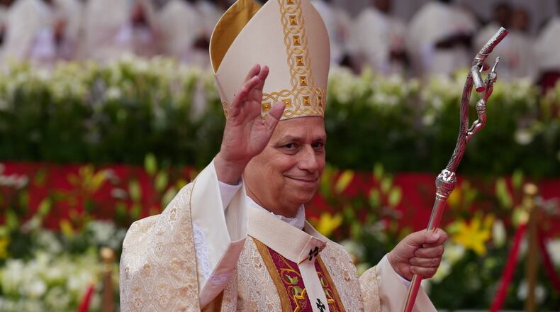 Pope Leo XIV arrives to celebrate the Holy mass at the Malabo stadium, in Malabo, Equatorial Guinea, Thursday, April 23, 2026, on the last day of his 11-day pastoral visit to Africa. (AP Photo/Misper Apawu)