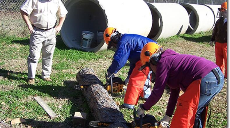 Chainsaw training is among the emergency response skills taught at Peachtree City’s CERT classes. Courtesy Peachtree City CERT