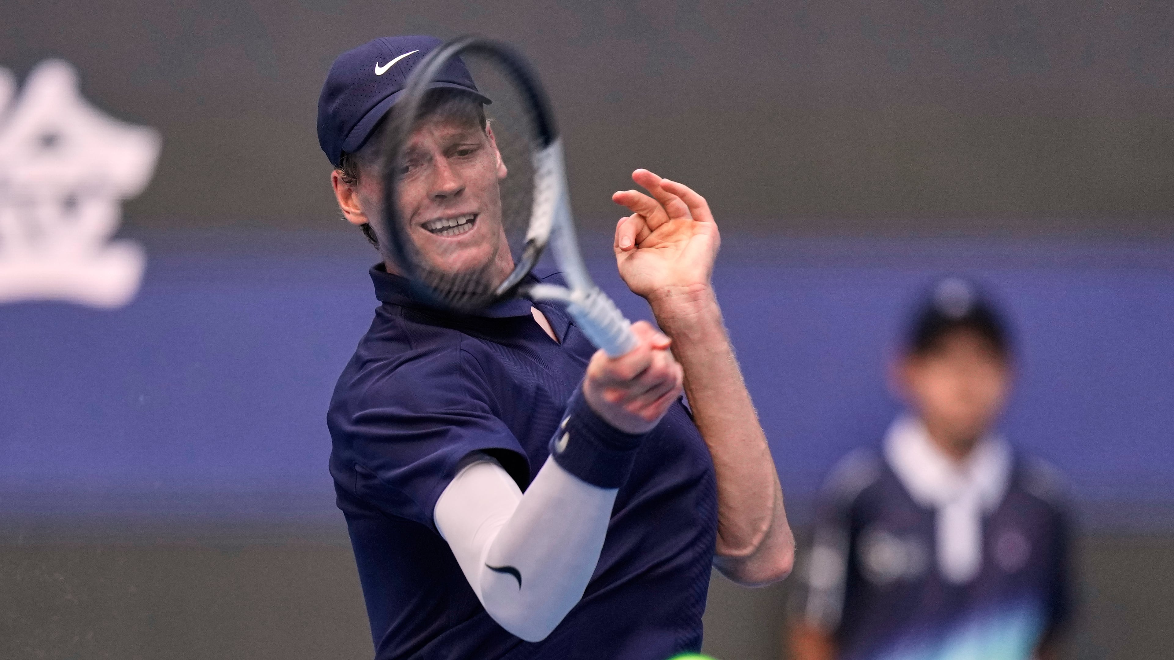 Jannik Sinner of Italy returns a forehand shot to Alex De Minaur of Australia during the men's singles semifinal match for the China Open tennis tournament, in Beijing, China, Tuesday, Sept. 30, 2025. (AP Photo/Mahesh Kumar A.)
