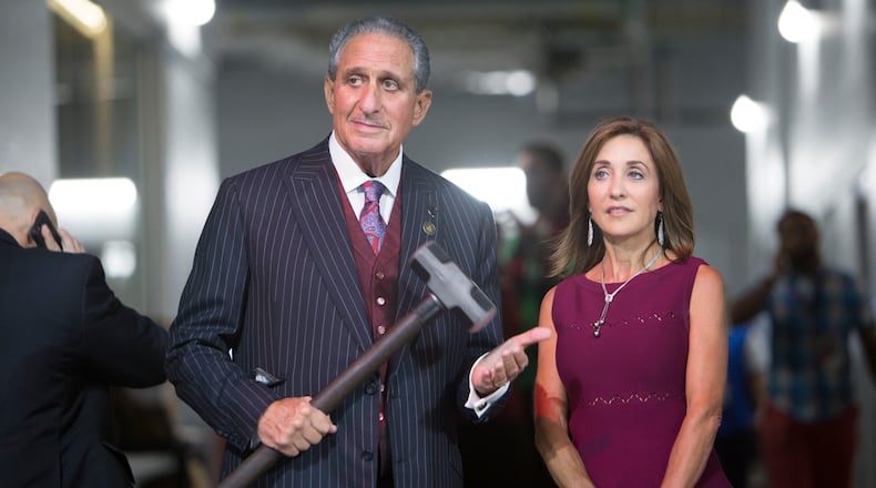 Atlanta United FC owner Arthur Blank waits with his wife, Angie Macuga, before the MLS All-Star Game Wednesday, Aug. 1, 2018, at the Mercedes-Benz Stadium in Atlanta.