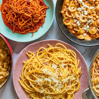 Get a tasty pasta dinner on the table using ingredients you already have at home. Clockwise from top left: Chili Crisp Assassin's Spaghetti, Tagine-Inspired Pasta e Ceci, Muffuletta Pasta, German-Inspired Carbonara and Miso-Kimchi Macaroni and Cheese. (Aaliyah Man for the AJC)