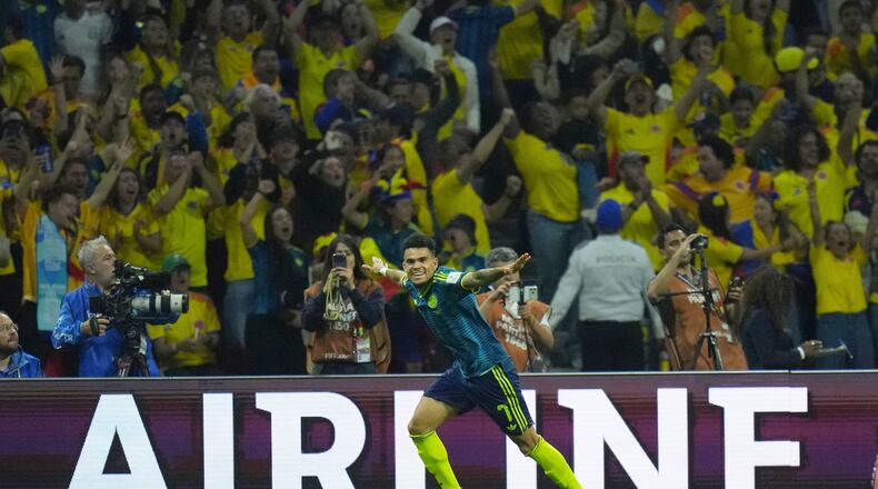 Colombia's Luis Diaz (7) celebrates after scoring his team's second goal during the World Cup Group K soccer match between Uzbekistan and Colombia in Mexico City, Wednesday, June 17, 2026. (AP Photo/Eduardo Verdugo)