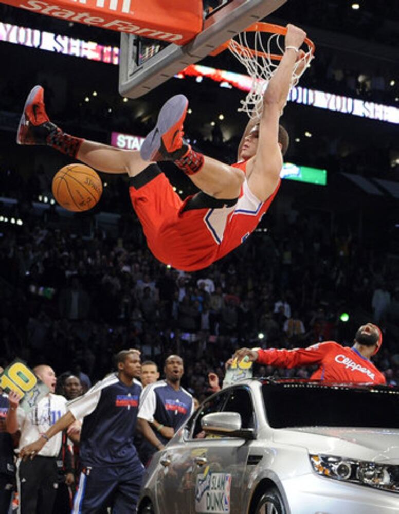 Blake Griffin dunks over a car