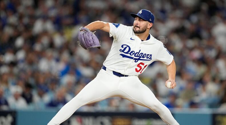 Los Angeles Dodgers pitcher Alex Vesia throws against the Milwaukee Brewers during the seventh inning in Game 4 of baseball's National League Championship Series, Friday, Oct. 17, 2025, in Los Angeles. (AP Photo/Brynn Anderson)