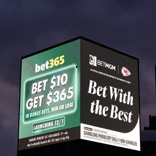 FILE - Advertisements for sports betting apps are seen in downtown Kansas City, Mo., Nov. 29, 2025. (AP Photo/Charlie Riedel, File)