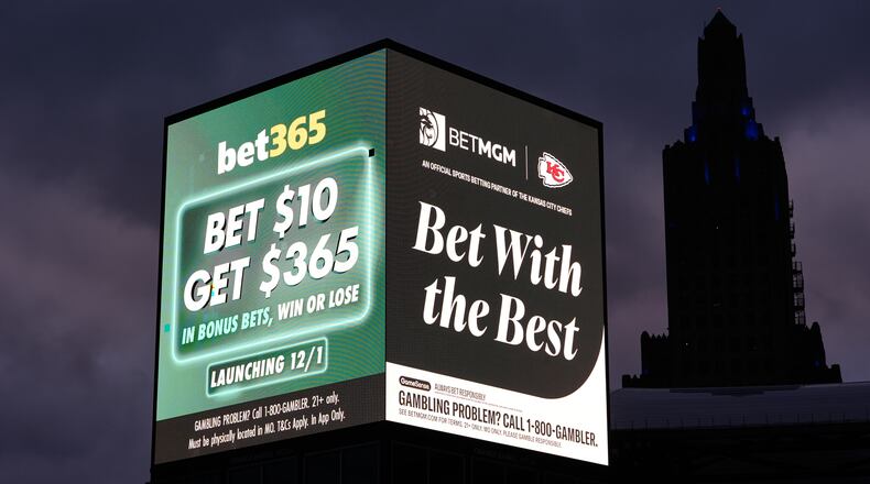 FILE - Advertisements for sports betting apps are seen in downtown Kansas City, Mo., Nov. 29, 2025. (AP Photo/Charlie Riedel, File)